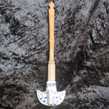 Handquirl mit Porzellankopf