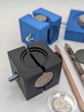 Münzhalter coin zur Reinigung