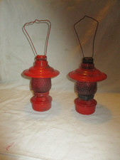 2 kleine Petroleumlampen rot