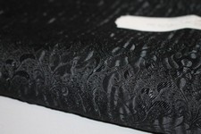 Reststück - Jackenstoff - schwarz geprägt