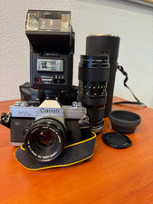 Canon FTb mit 2 Objektiven: FD 50mm 1:1,8 S.C.+75-205mm 1:3,8+Blitz REGULA 730-2