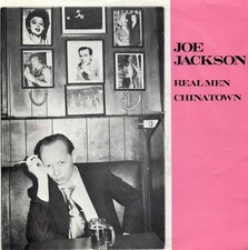 (single 7") Joe Jackson - Real