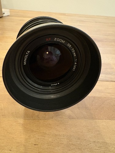 Minolta 70mm zoom - f/4,