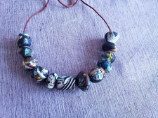 11 antike Millefiori Perlen