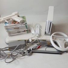 Nintendo Wii Family Bundle - Konsole, 8 Spiele, Balance Board, Controller