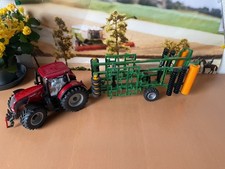 siku 3281 Valtra S-Series Metallic-Rot & 4231 Amazone 6000 BBG