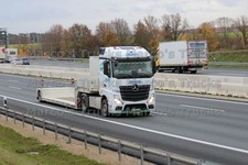 LKW Foto Mercedes-Benz Actros Plattformanhänger Deutschland weiß DENIOS. #l4lq