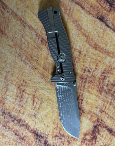 Lionsteel sr1 damascus - lionsteel,