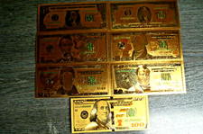 7 USA Banknoten in "GOLD-Folie". 1, 2, 5, 10, 20, 50 und 100 Dollar, unbenutzt
