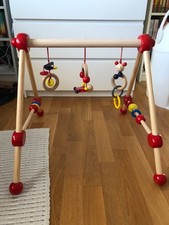 spielbogen baby holz rot und