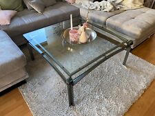 Wohnzimmertisch aus Metall mit 12 mm starker Glasplatte. Maße: 100 x 100 x 45 cm