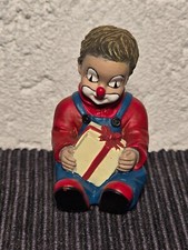 Gilde Clown sitzend mit
