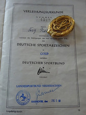 Sport-Abzeichen gold mit