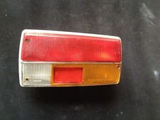 R255/  Peugeot 304  Rücklicht