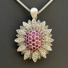 CLIP-ANHÄNGER MIT 37 RUBINEN