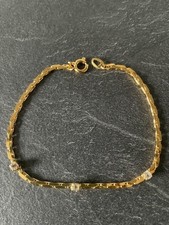 Vintage Armband goldfarben mit 3 weißen Steinen