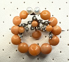 Wunderschöne Korallenbrosche
