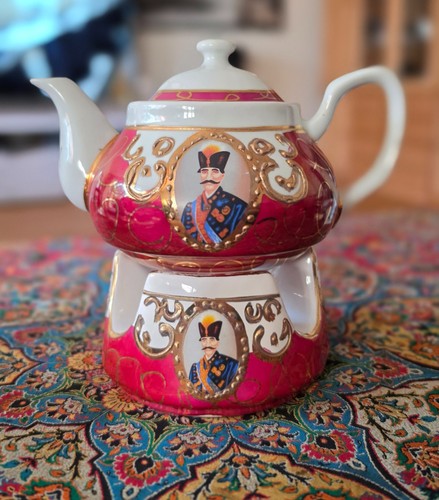 Teekanne mit stövchen - teekanne,