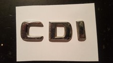 Oldtimer Mercedes Emblem CDI = sind einzelen Buchstaben - Reste vom Klebeband