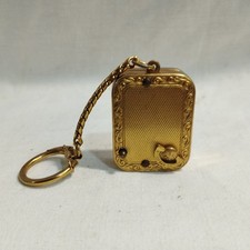 REUGE St. Croix mechanische Spieluhr als eleganter Schlüsselanhänger.