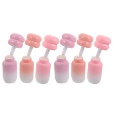 6 leere Lipgloss-Tuben mit