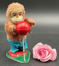 antikes Blechspielzeug Affe