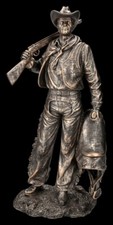 Cowboy Figur mit Gewehr und