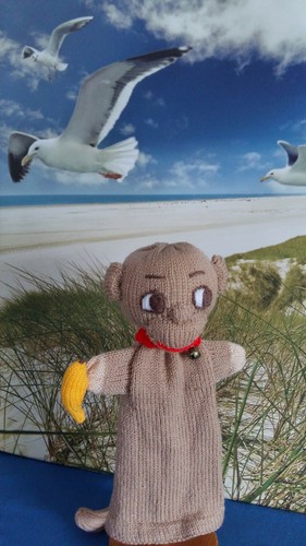 Handpuppe affe mit banane - handpuppe,