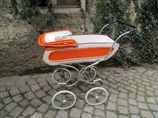 Puppenwagen orange 70 er Jahre