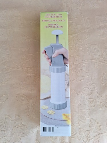 Gebäck und sahnespritze neu - und,