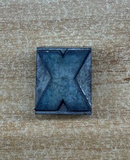 Alter großer Druckbuchstabe