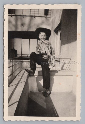 Boy dressed cowboy for - as,
