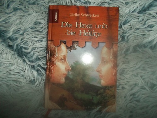 Die hexe und heilige - und, von