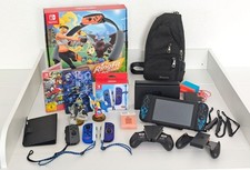 Nintendo Switch Konsole inkl. Ring Fit, Tasche, 2 Spiele, 2 Amiibo-Figuren etc.