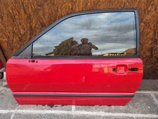 VW Corrado Fahrertür mit intakter Fensterscheibe in der Originalfarbe Flashrot