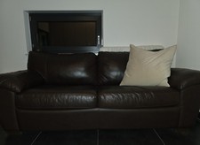 Dunkelbraunes Ledersofa von