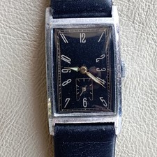 Herrenarmbanduhr mit Urofa 58 Uhrwerk Rechteck- Tank- Form mit Clip- Armband