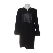 Tiger of Sweden, Mantel