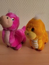 2 Dinosaurier Plüsch Plüschtier Stofftier orange und pink Kunststoffaugen