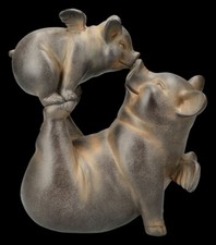 Schweine Figuren mit Flügeln