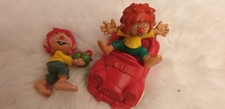 Bully Pumuckl im roten Auto