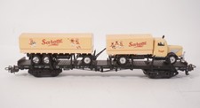 Märklin H0 4663 Flachwagen mit Rungen und Ladung Sarotti LKW Modell (Grell)