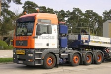 LKW Foto MAN TGA 41.530 Schwerlasttransporter Deutschland orange UNIVERSA #m3yw