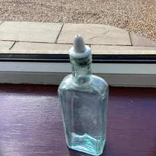 Vintage hellgrüne Glasflasche