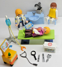 Frau im Krankenhaus + Arzt