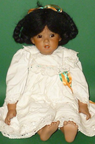 Farbige porzellankopfpuppe - farbige,