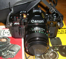 Canon A-1 Camera mit FD 1,4 / 50; CANON Blitz 188A + umfangreiches Zubehör; TOP