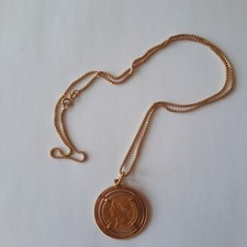 Goldmünze als Anhänger