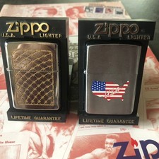 Zippo Feuerzeuge 2 Stück aus  Sammlung--neu  in Verpackung. 1 x Silverplate 1992