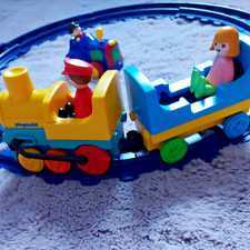 Kunterbunte Schiebebahn im Kreis Playmobil 123